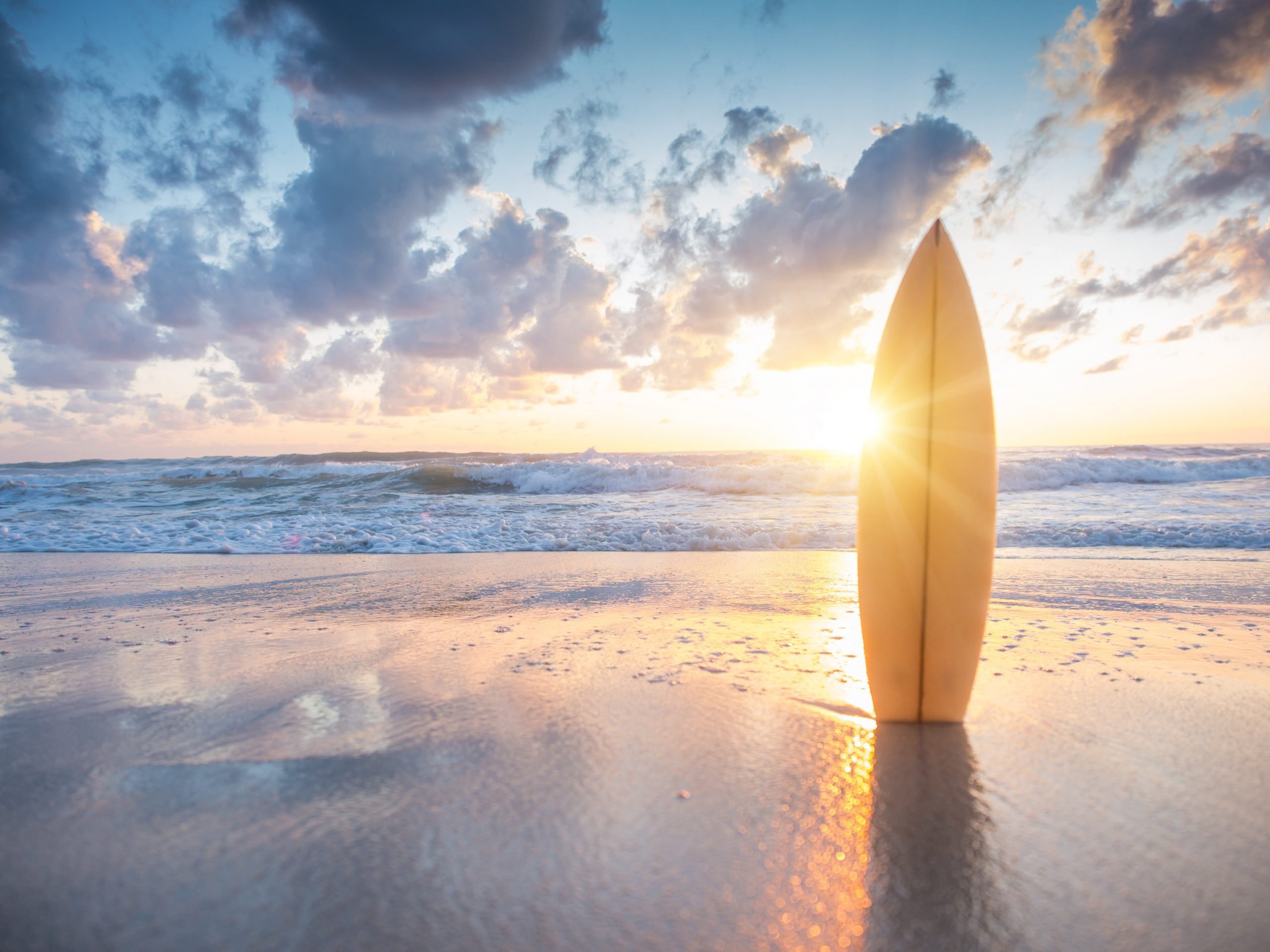 Surfboard On The Beach At Sunset Custom Wallpaper