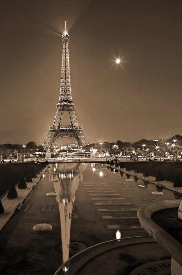 The Eiffel tower reflected in the fountains of the Trocadero gardens, Paris, France. View from Palais de Chaillot.
