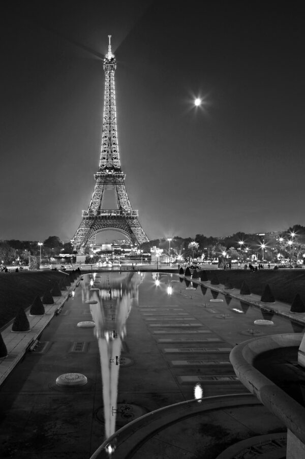 The Eiffel tower reflected in the fountains of the Trocadero gardens, Paris, France. View from Palais de Chaillot.